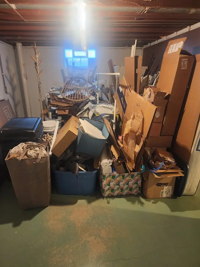 Roll-off dumpster container at job site for 20 Yard Dumpster Rental in Cutler